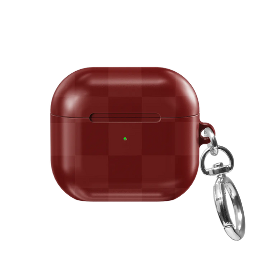 Maroon Check AirPods case, front view showing tonal burgundy checkerboard pattern and lanyard clasp