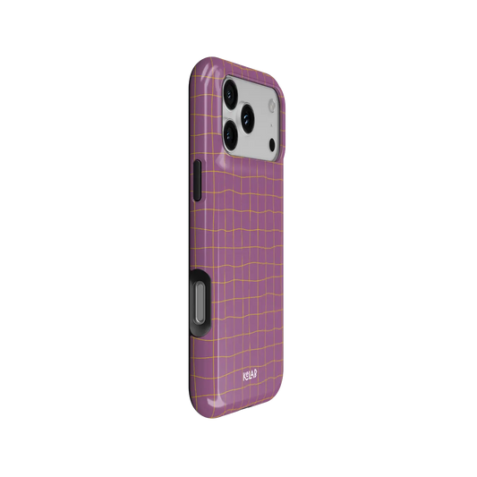 Coral Code pink yellow grid Tough iPhone case, side view showing the pattern wrapped around the shell.