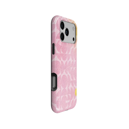 Bubblegum Breeze pink retro geometric circles Tough iPhone case, side view showing the pattern wrapped around the shell.