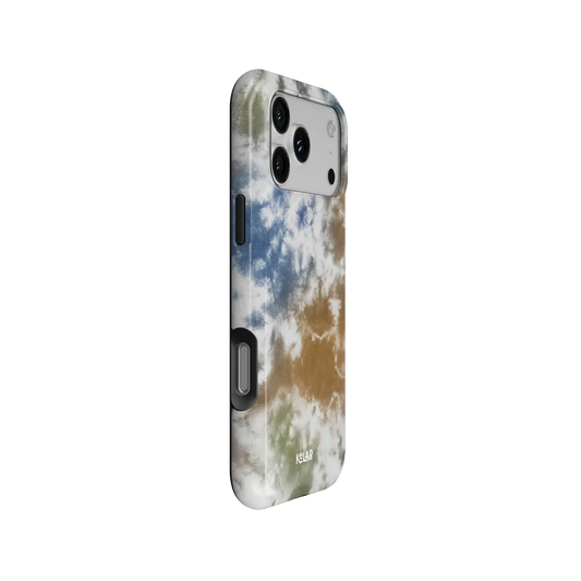 Indigo Soil brown-blue tie-dye Tough iPhone case, side view showing the pattern wrapped around the shell.