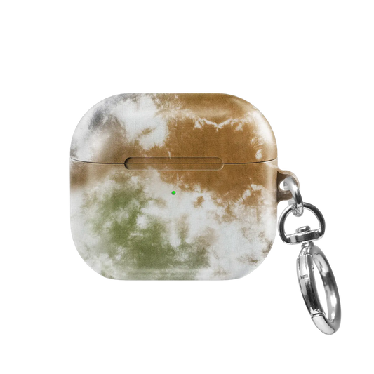 Indigo Soil AirPods case — front view showing sandy brown tie-dye pattern with keychain clasp