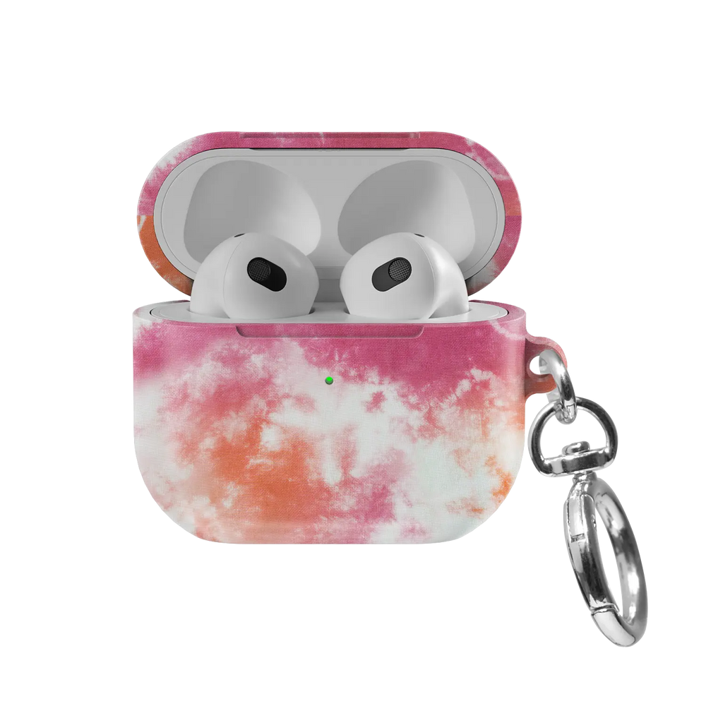Citrus Blush AirPods case — front view with lid open, showing pink-orange tie-dye swirl and AirPods nested inside