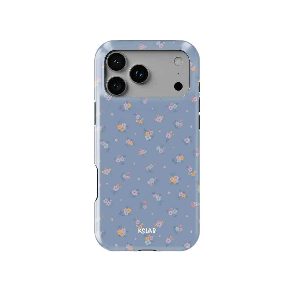 Tiny Meadow pastel blue floral Tough iPhone case, front view showing the pattern.