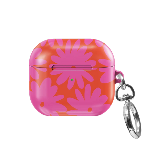 Sunflare Daisy AirPods case — front view showing bold pink daisy floral pattern with keychain clasp