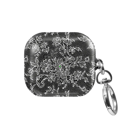 Midnight Garden AirPods case — front view showing intricate white floral lace on deep black with keychain clasp