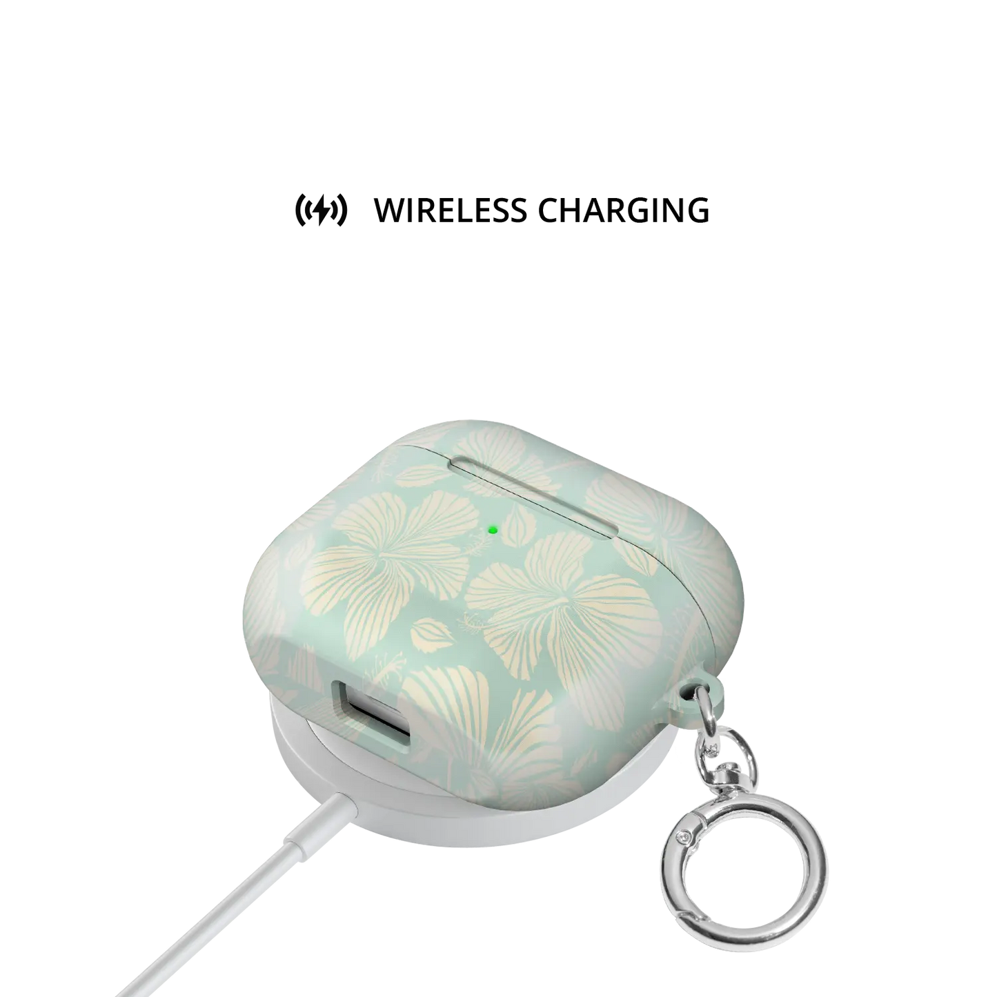 Island Mist | Green Hibiscus Floral AirPods Case - shown on wireless charger