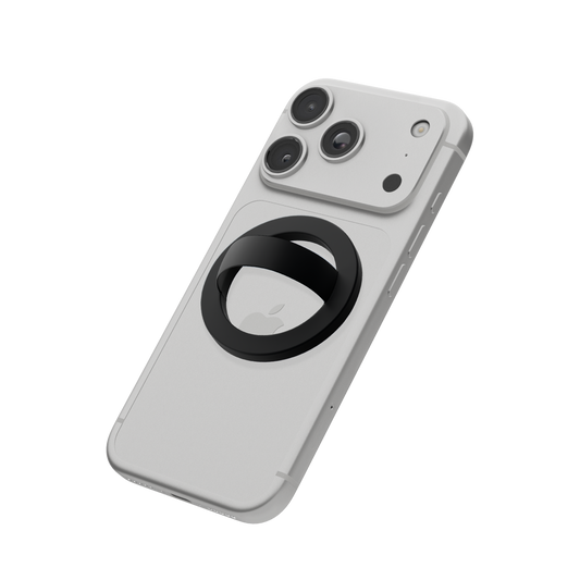 Black MagSafe silicone phone grip attached to the back of an iPhone