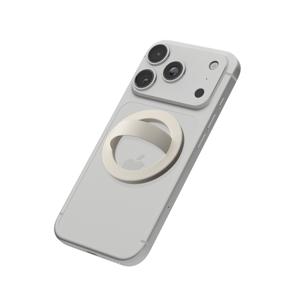 Ivory MagSafe loop grip attached to the back of an iPhone