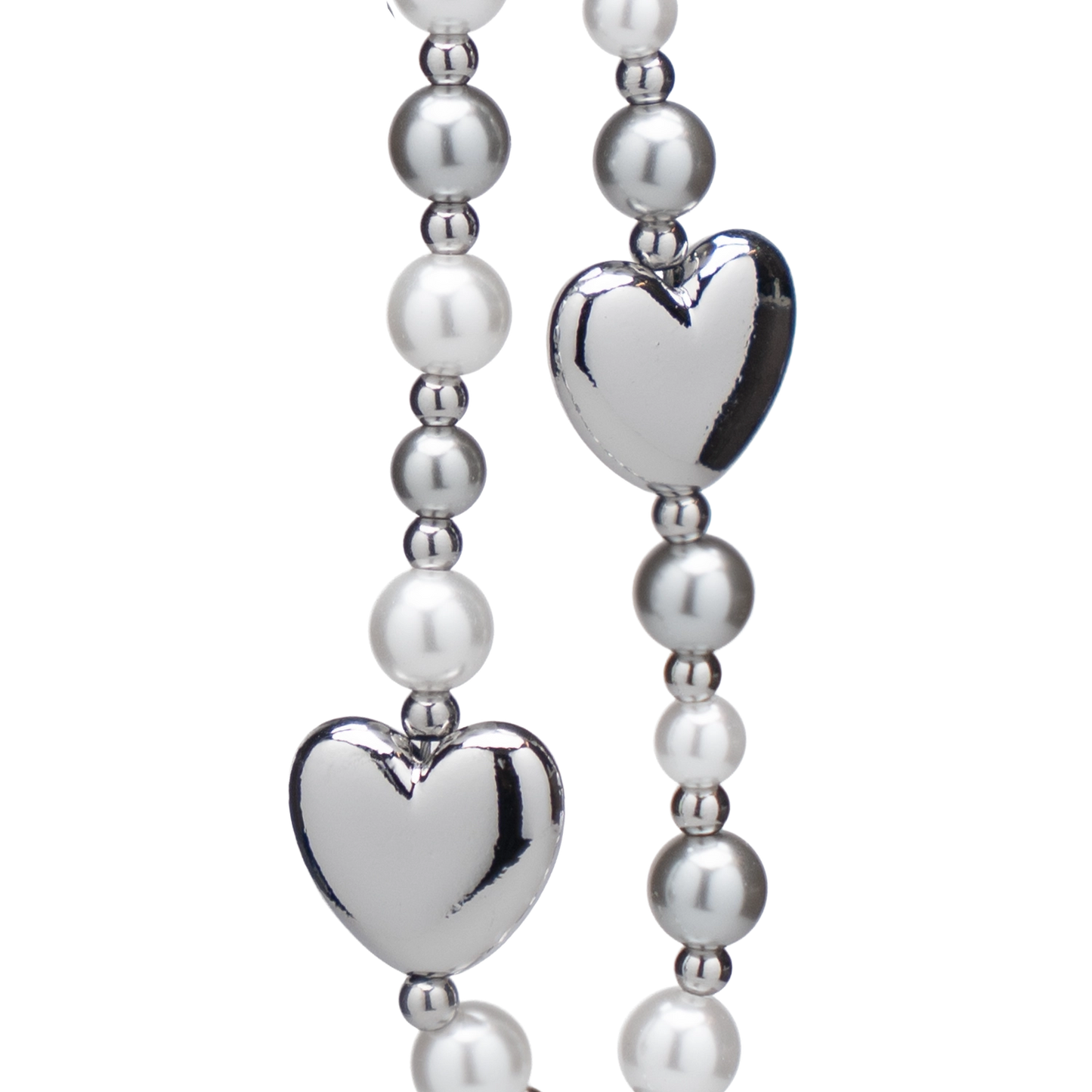 Silver heart phone charm with alternating pearlescent beads, stylish and elegant accessory for any occasion.