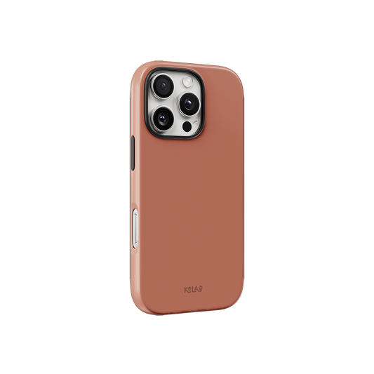 Solid nude phone case by KELAB shown at an angle, highlighting its minimalist design and snug fit for iPhone models.