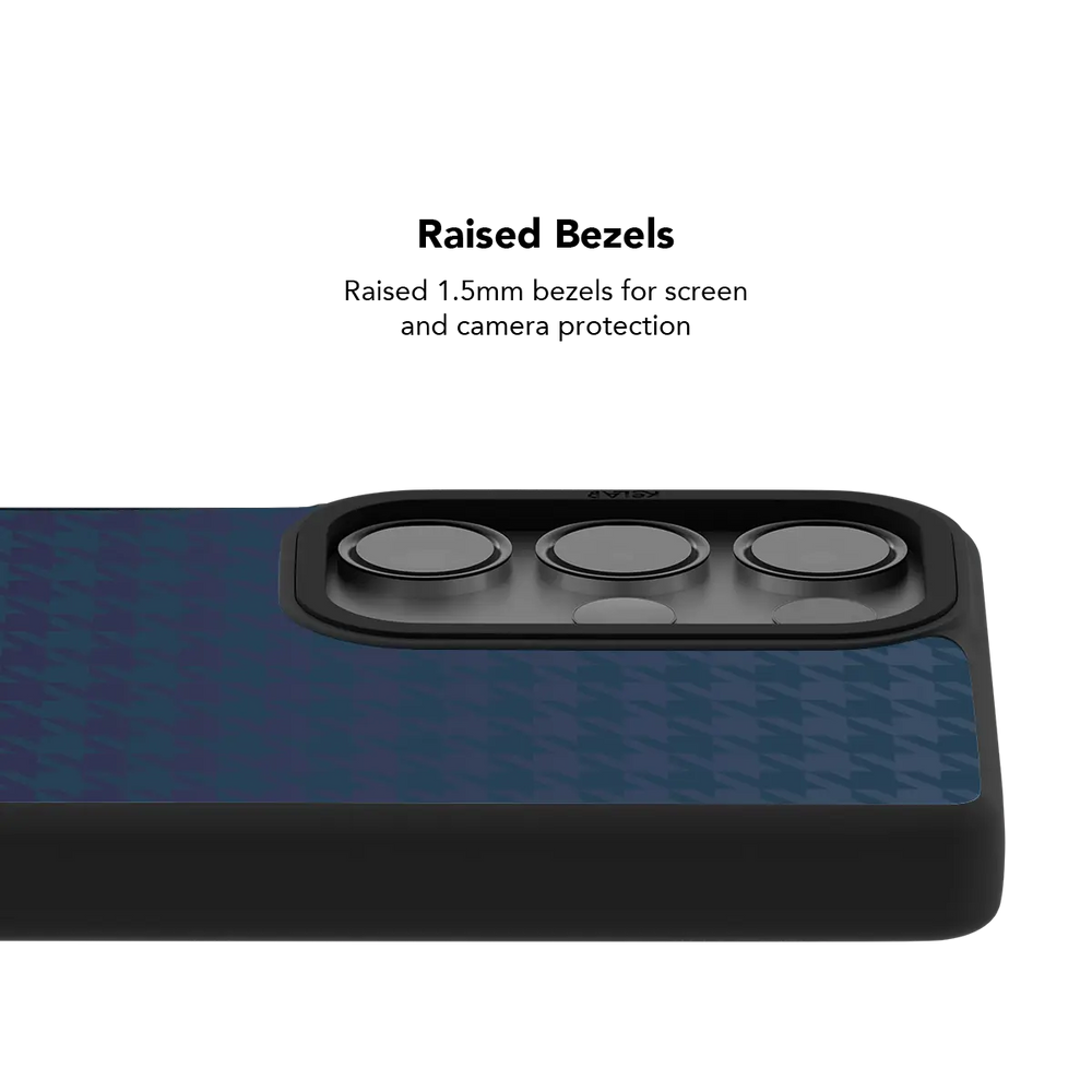 Raised bezel on the blue houndstooth Galaxy case lifting the camera lenses clear of a flat surface