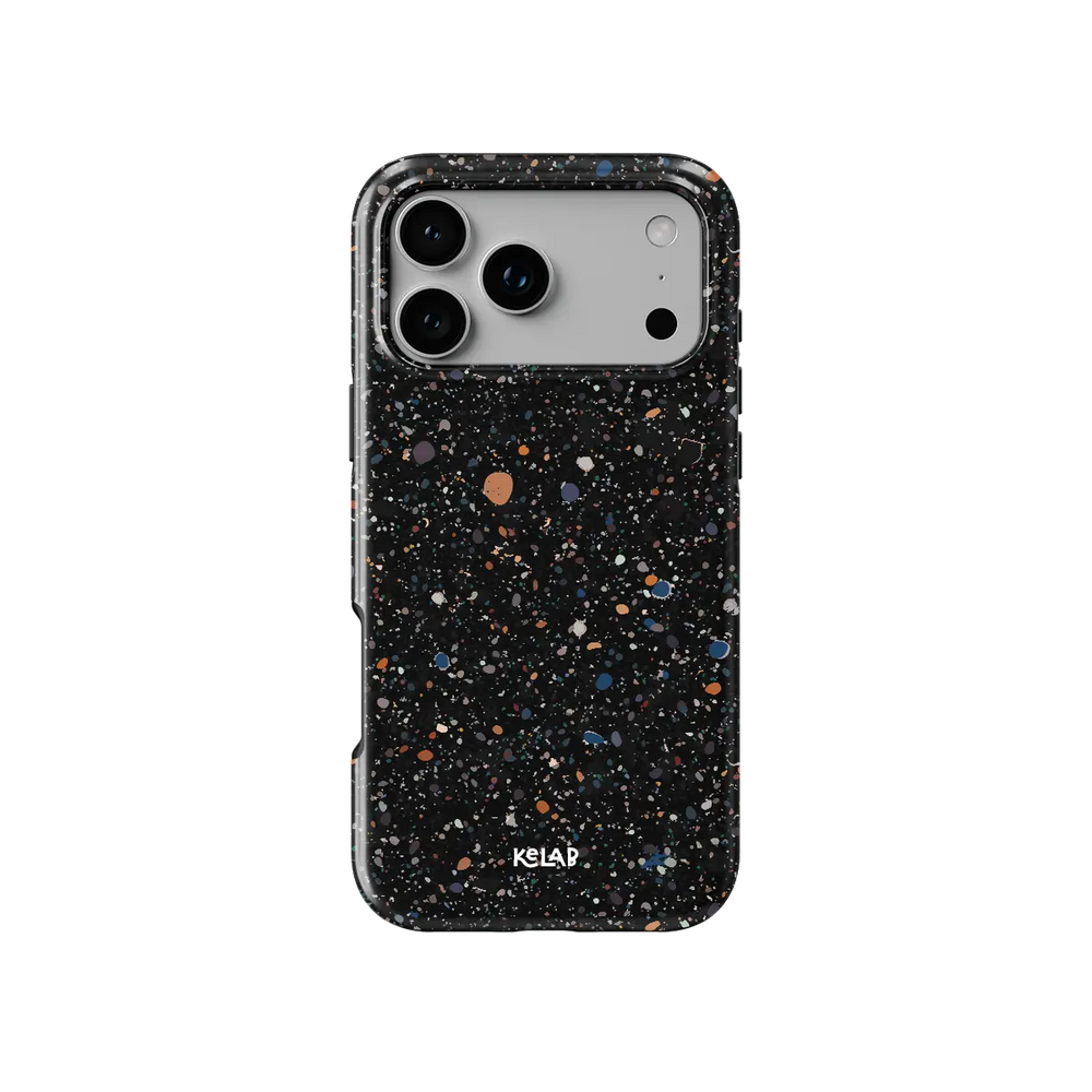 Obsidian Mist black paint splatter Tough iPhone case, front view showing the pattern.