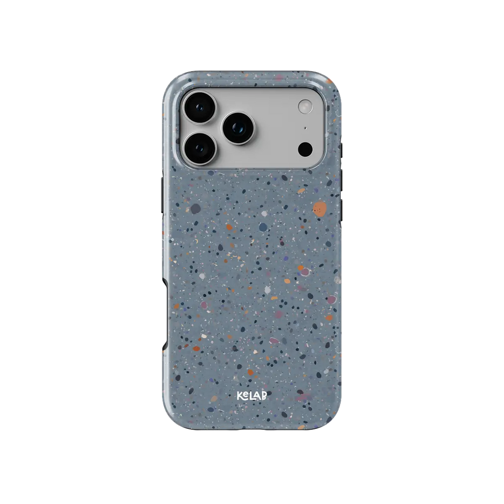 Seaside Drift blue paint splatter Tough iPhone case, front view showing the pattern.