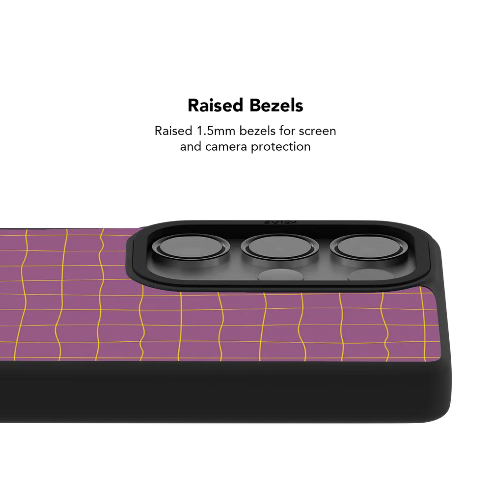 Raised bezel on the pink grid Galaxy case lifting the camera lenses clear of a flat surface