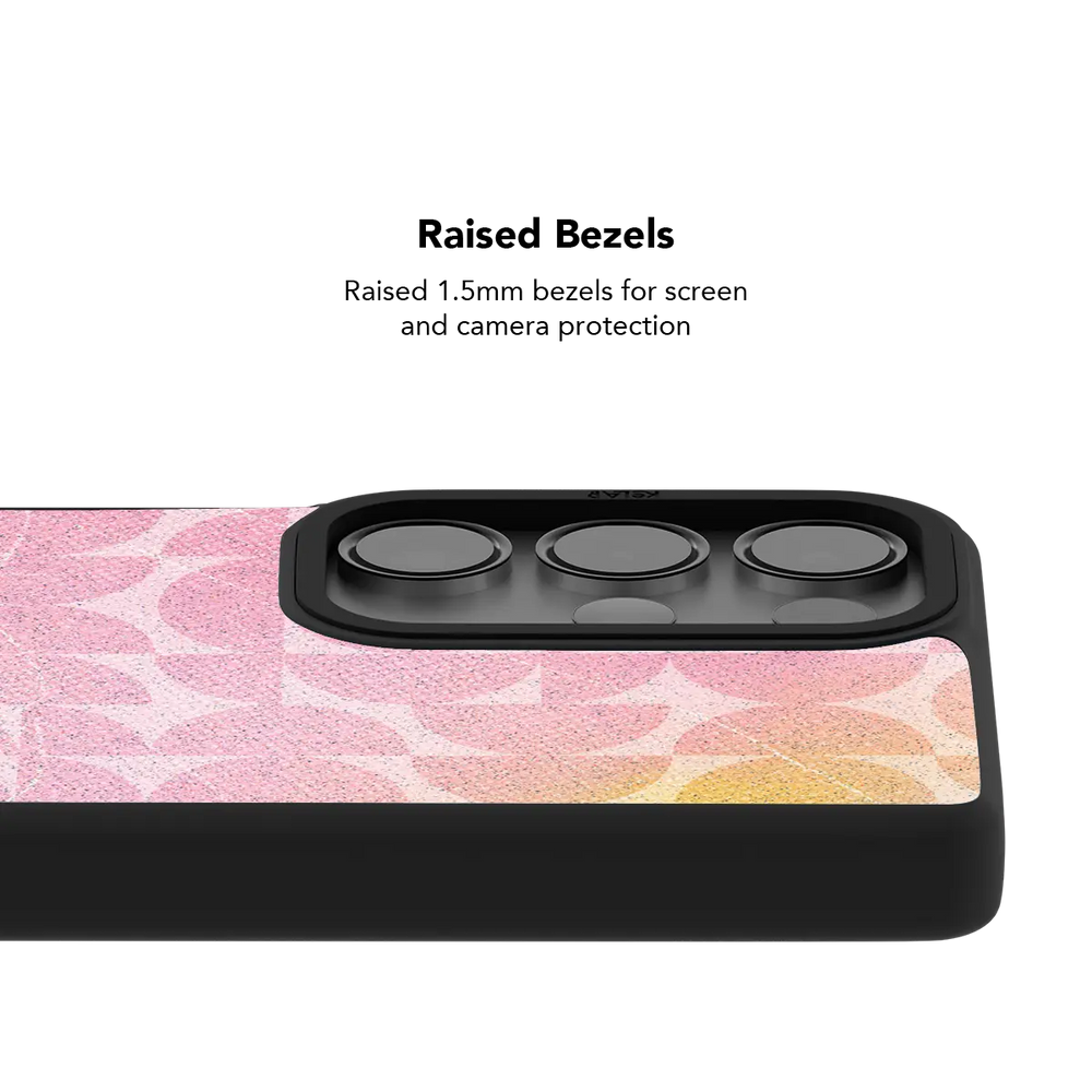 Raised bezel on the pink retro geometric Galaxy case lifting the camera lenses clear of a flat surface
