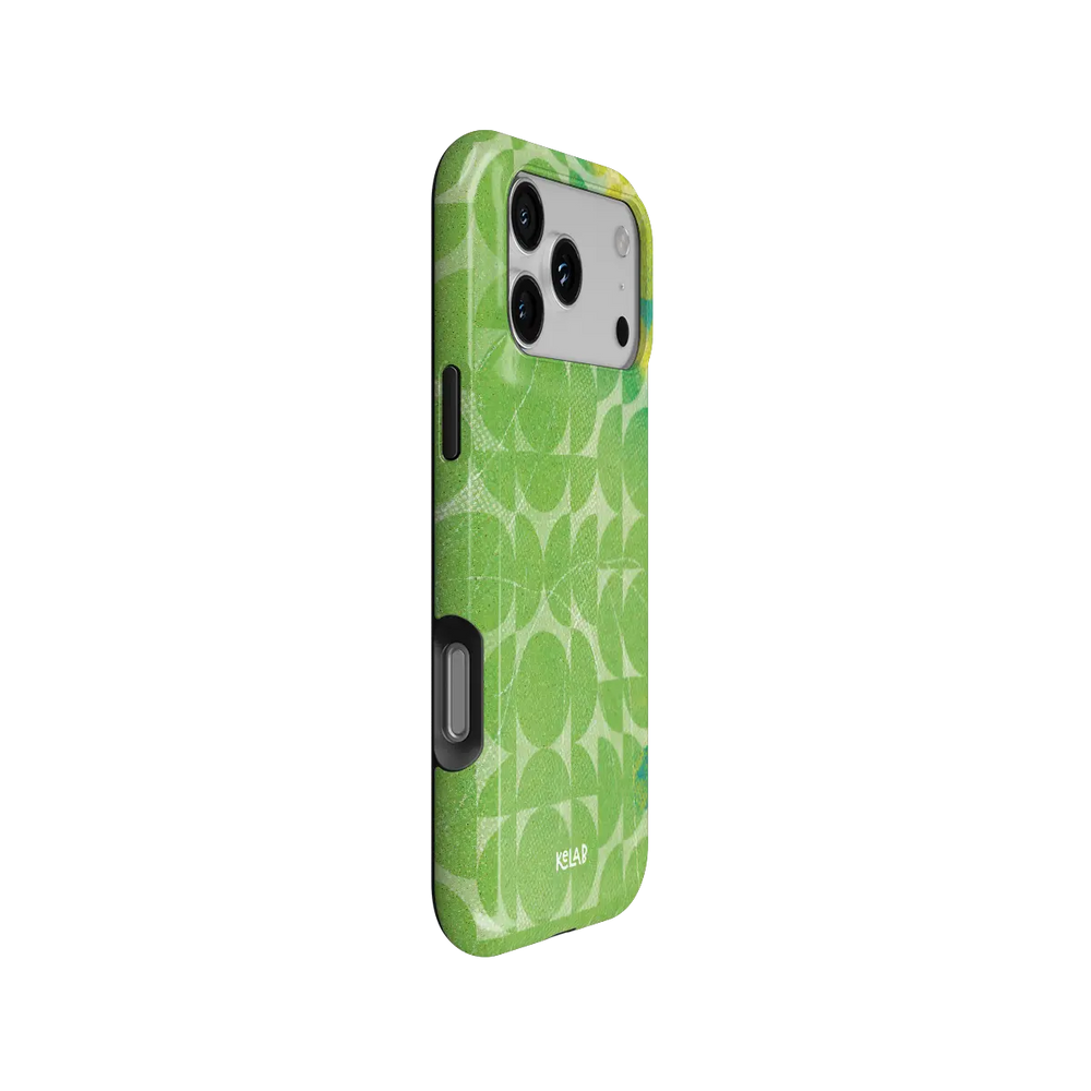 Lime Float green retro geometric circles Tough iPhone case, side view showing the pattern wrapped around the shell.
