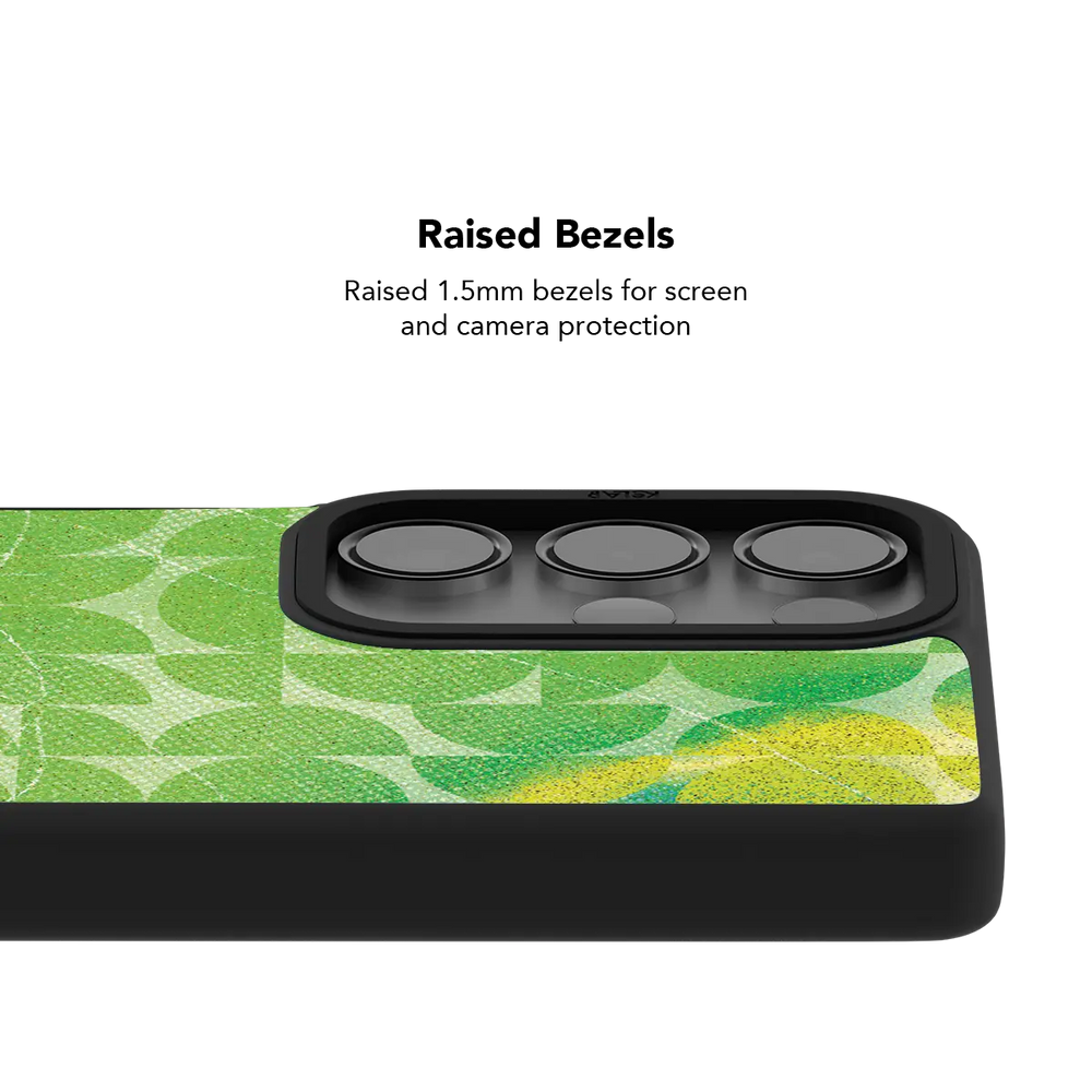 Raised bezel on the green retro geometric Galaxy case lifting the camera lenses clear of a flat surface