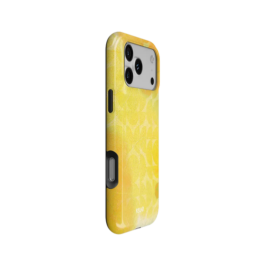 Zesty yellow retro geometric circles Tough iPhone case, side view showing the pattern wrapped around the shell.