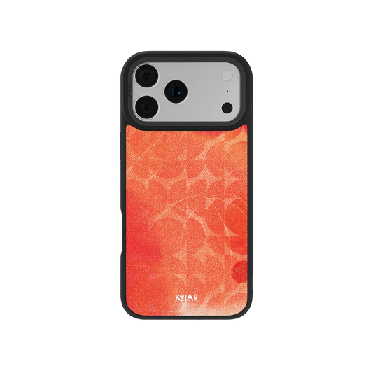 Red KELAB iPhone Case with geometric circle pattern, satin sheen texture and glossy finish