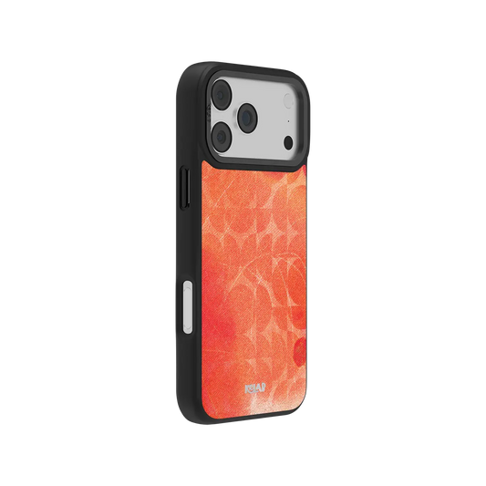 Satin sheen Blood Orange KELAB iPhone Case with geometric circle pattern and glossy texture