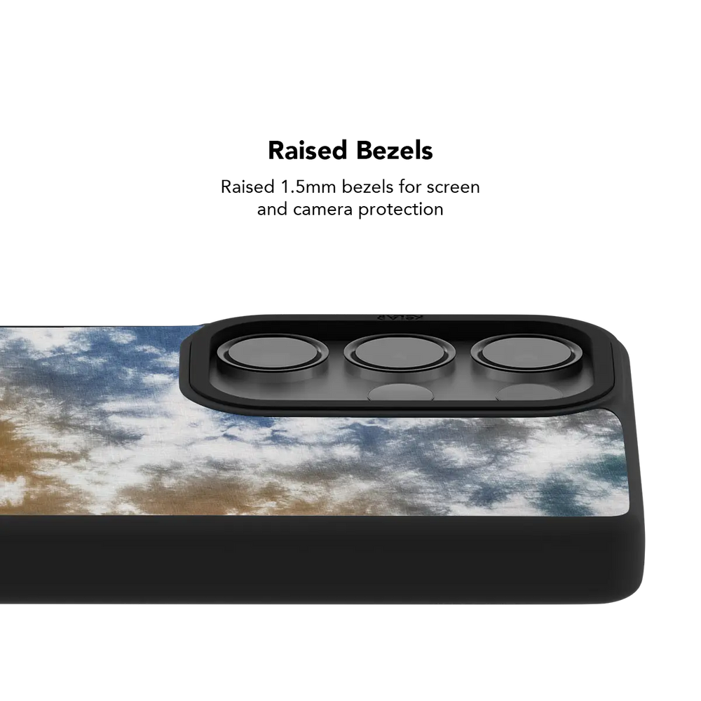Raised bezel on the brown blue tie dye Galaxy case lifting the camera lenses clear of a flat surface