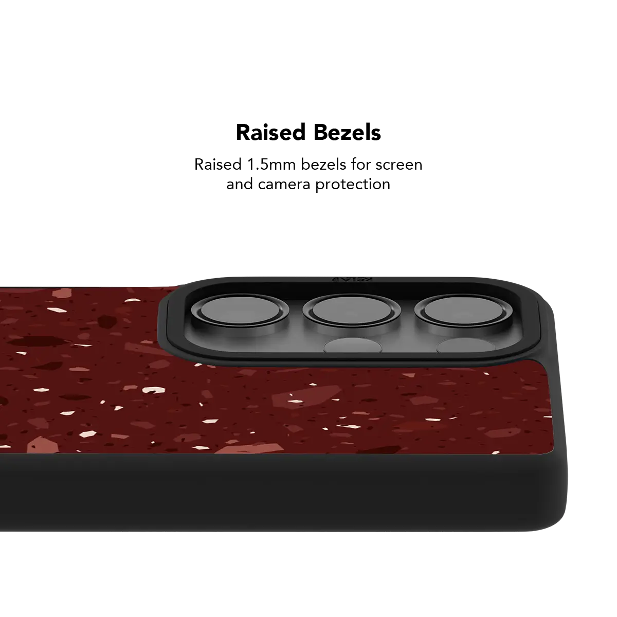 Raised bezel on the burgundy terrazzo Galaxy case lifting the camera lenses clear of a flat surface