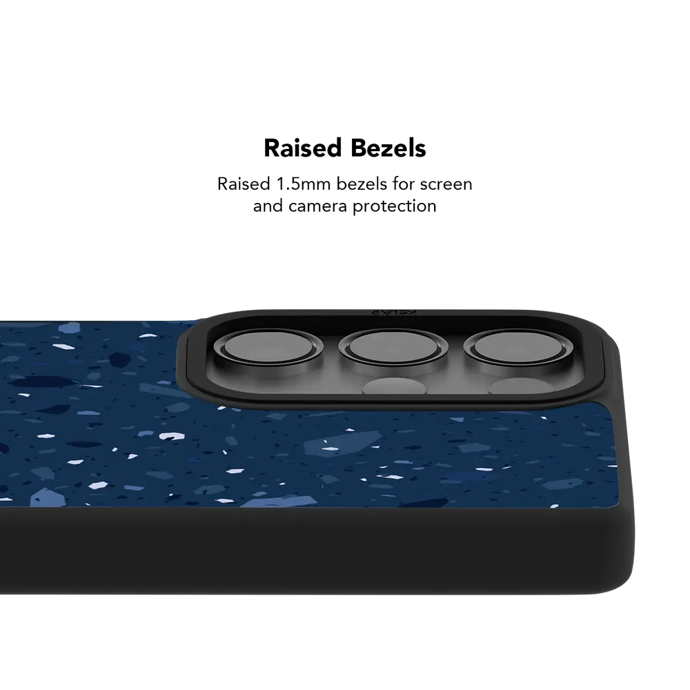 Raised bezel on the navy terrazzo Galaxy case lifting the camera lenses clear of a flat surface