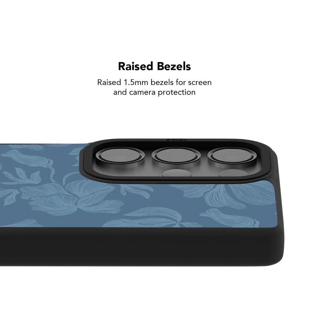 Raised bezel on the dusty blue floral Galaxy case lifting the camera lenses clear of a flat surface