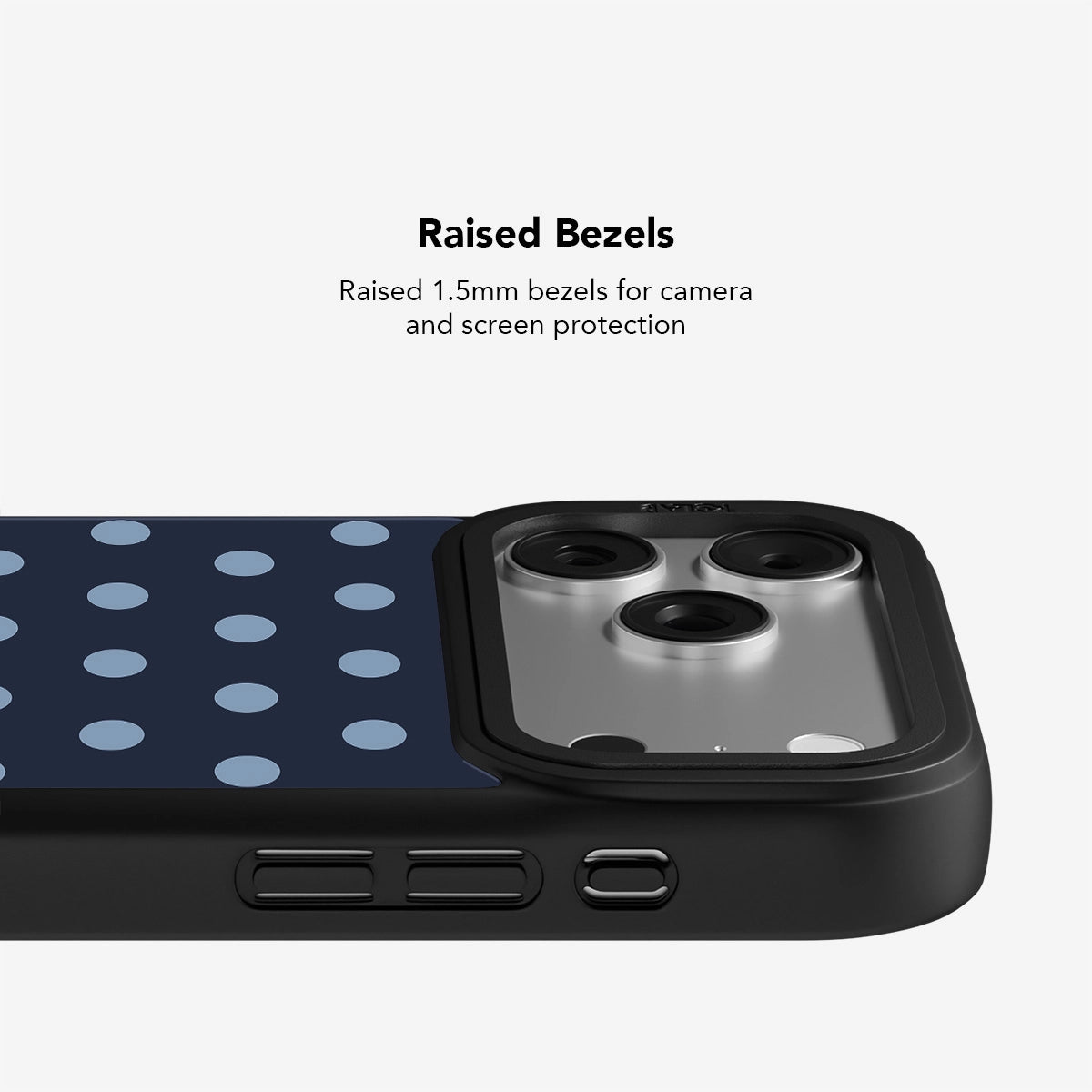 Navy polka dot phone case with raised 1.5mm bezels for camera and screen protection.