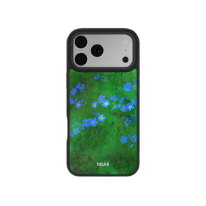 Vibrant green floral iPhone case by KELAB featuring whimsical blue flowers on a glossy surface. Ideal for spring-inspired phone accessories.