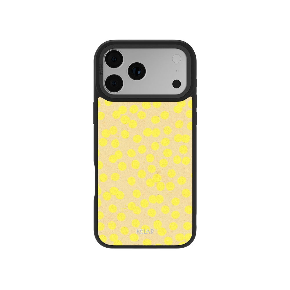 Retro Style Yellow Dotted iPhone Case by KELAB featuring a butter yellow polka dot design with a sleek black bumper for a chic summer aesthetic.