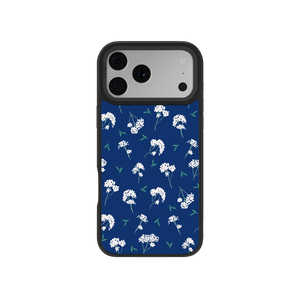 White floral iPhone case with cobalt blue background featuring baby's breath design and green leaves, perfect for a stylish botanical look.