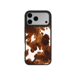 Brown and white cow print iPhone case by KELAB with mahogany tones and soft fur-like pattern, designed for a rustic, country-inspired aesthetic.