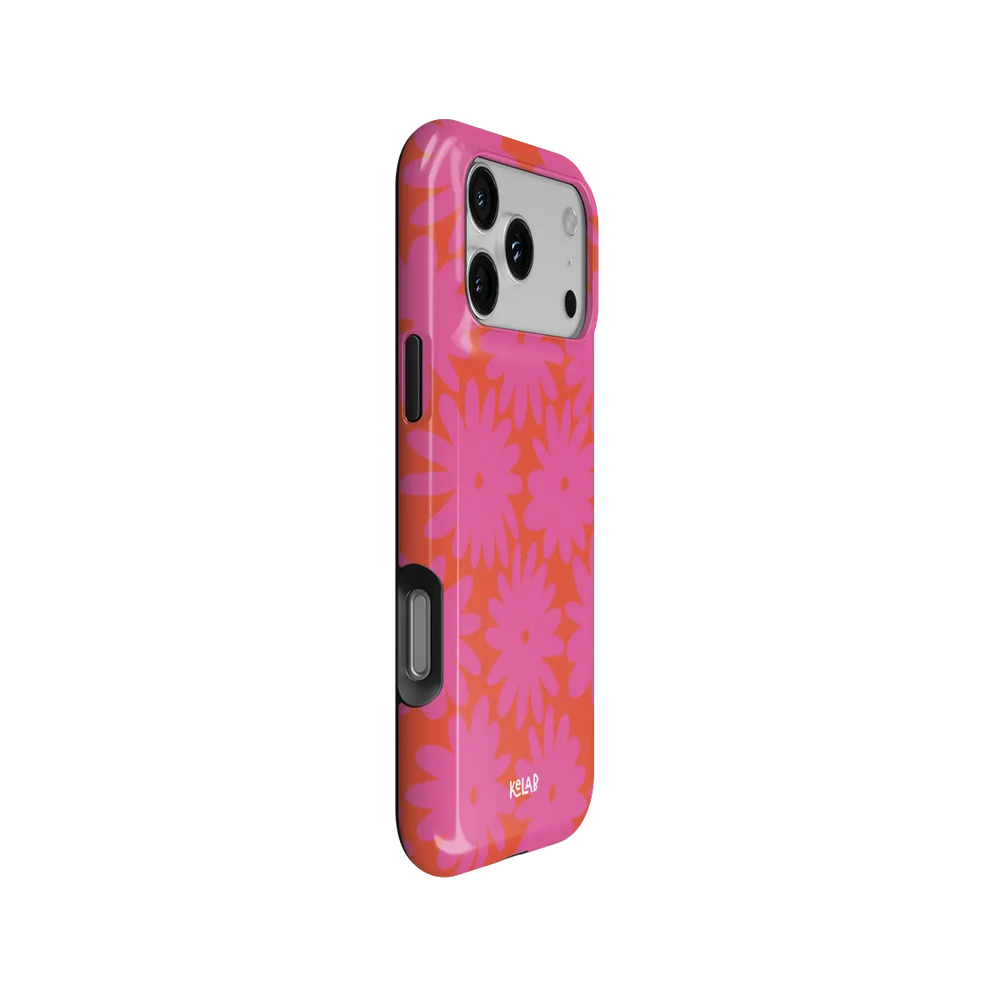 Sunflare Daisy pink daisy floral Tough iPhone case, side view showing the pattern wrapped around the shell.