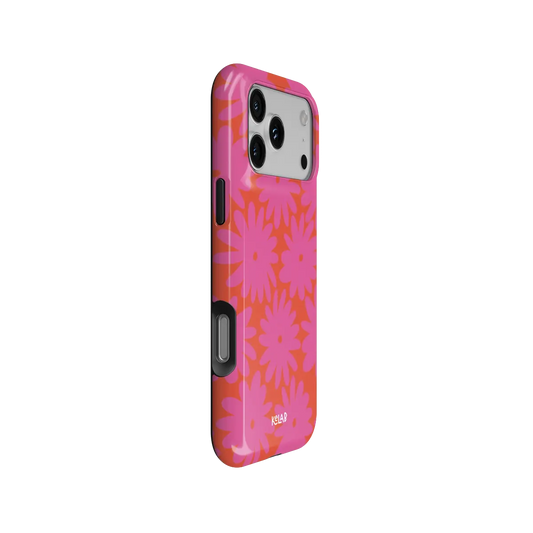 Sunflare Daisy pink daisy floral Tough iPhone case, side view showing the pattern wrapped around the shell.