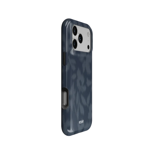 Acid Flora dark blue floral Tough iPhone case, side view showing the pattern wrapped around the shell.