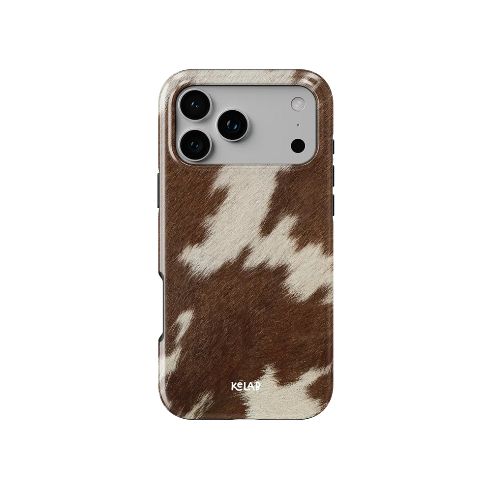 KELAB iphone case with cow print animal pattern on glossy brown polycarbonate shell