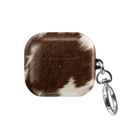 Rodeo Drive brown and white cow print AirPods case, front side view