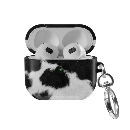 Cow Bell black and white cow print AirPods case, front view with open lid
