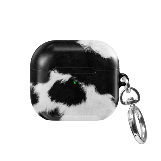 Cow Bell black and white cow print AirPods case, front side view