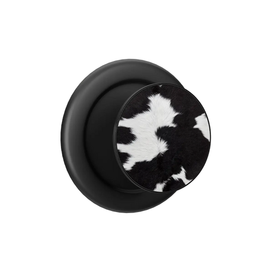 Black cow print MagSafe phone grip pop grip with built-in strong magnets and round base.