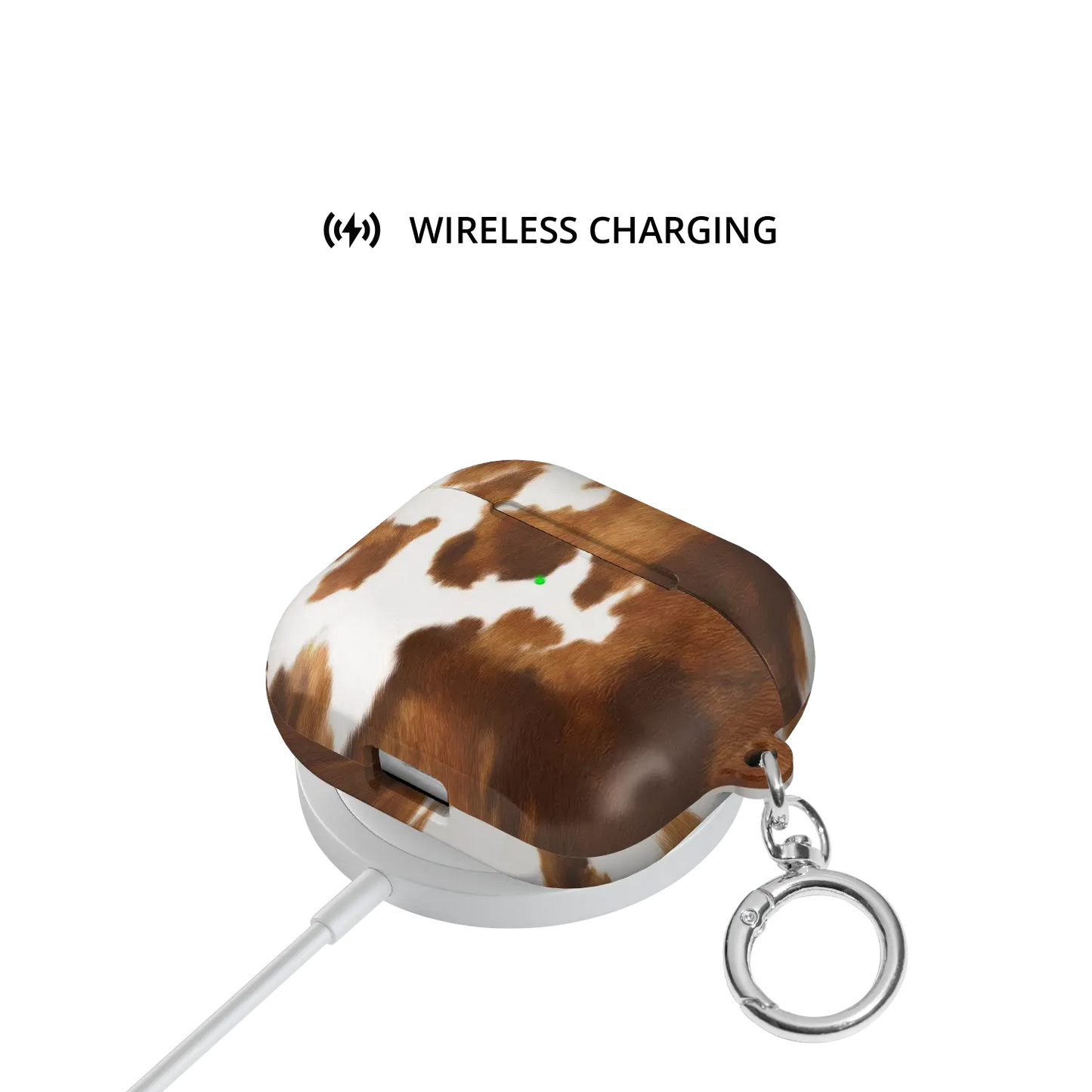 Milk & Mahogany | Brown & Cream Cow Print AirPods Case - shown on wireless charger