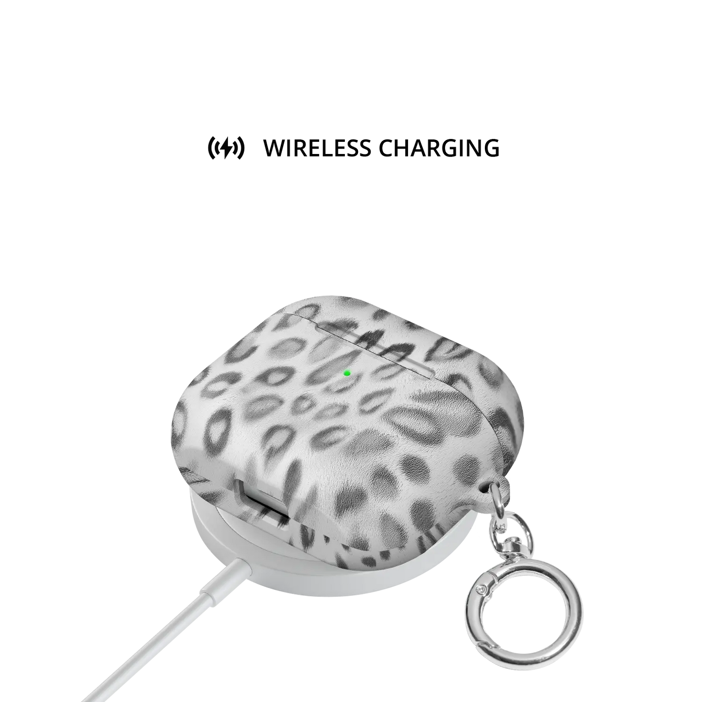 Platinum Predator | Black & White Cheetah AirPods Case - shown on wireless charger