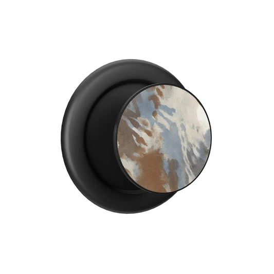 Black PopSocket with a colorful abstract design, serving as a phone grip and magnetic grip accessory.