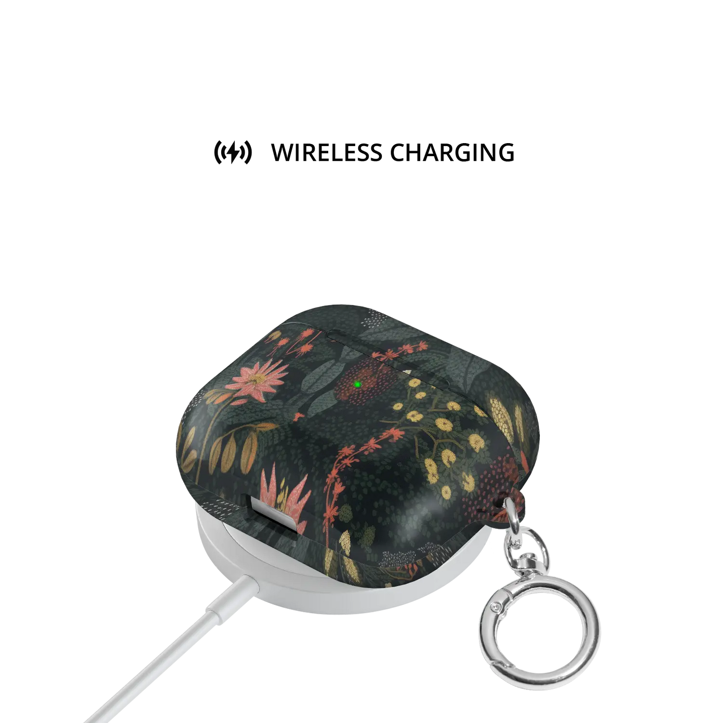 Starlit Botanica floral AirPods case on a wireless charger, MagSafe compatible
