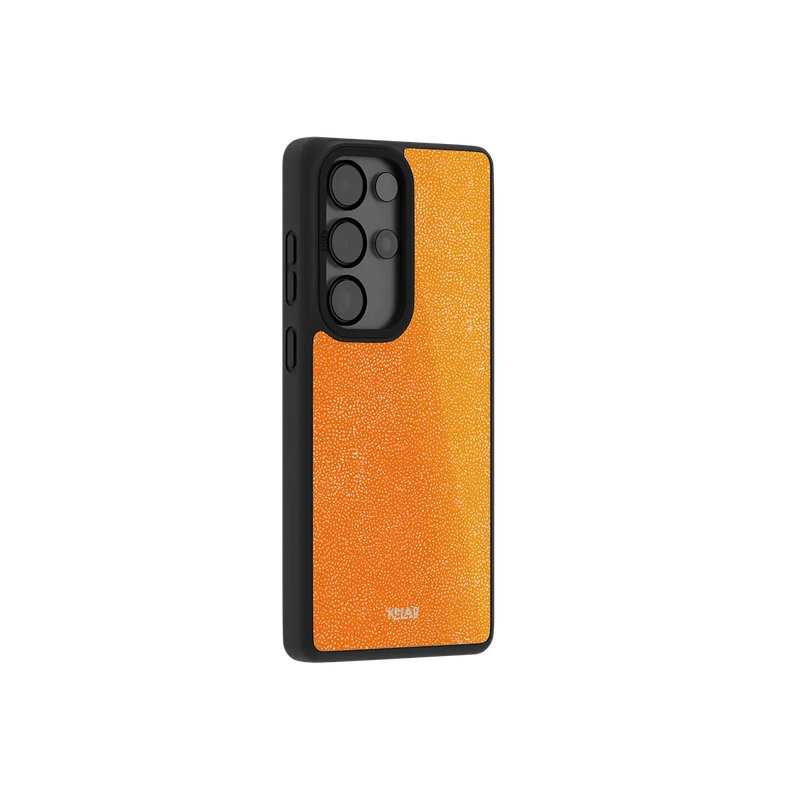 Orange textured Samsung Galaxy case at a side angle showing the wrapped button covers