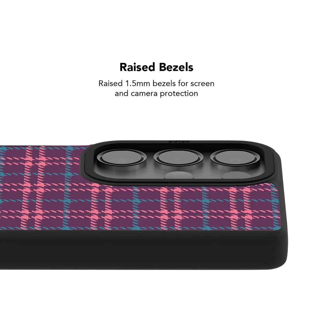 Raised bezel on the purple plaid Galaxy case lifting the camera lenses clear of a flat surface