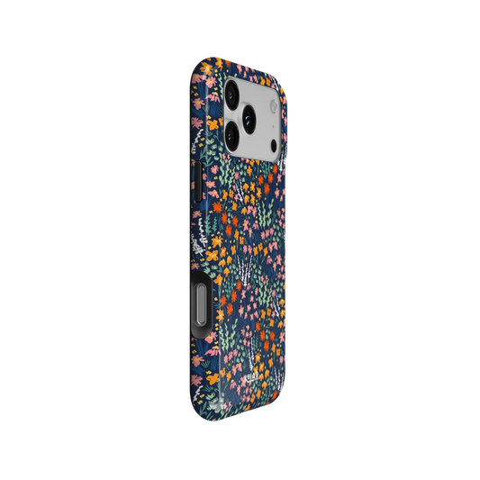Vibrant Wildflower iPhone Case, side angle view showing precise button cutouts and wraparound edge