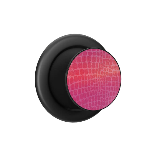 Black popsocket with a vibrant pink textured surface — a stylish magsafe grip for modern phone essentials