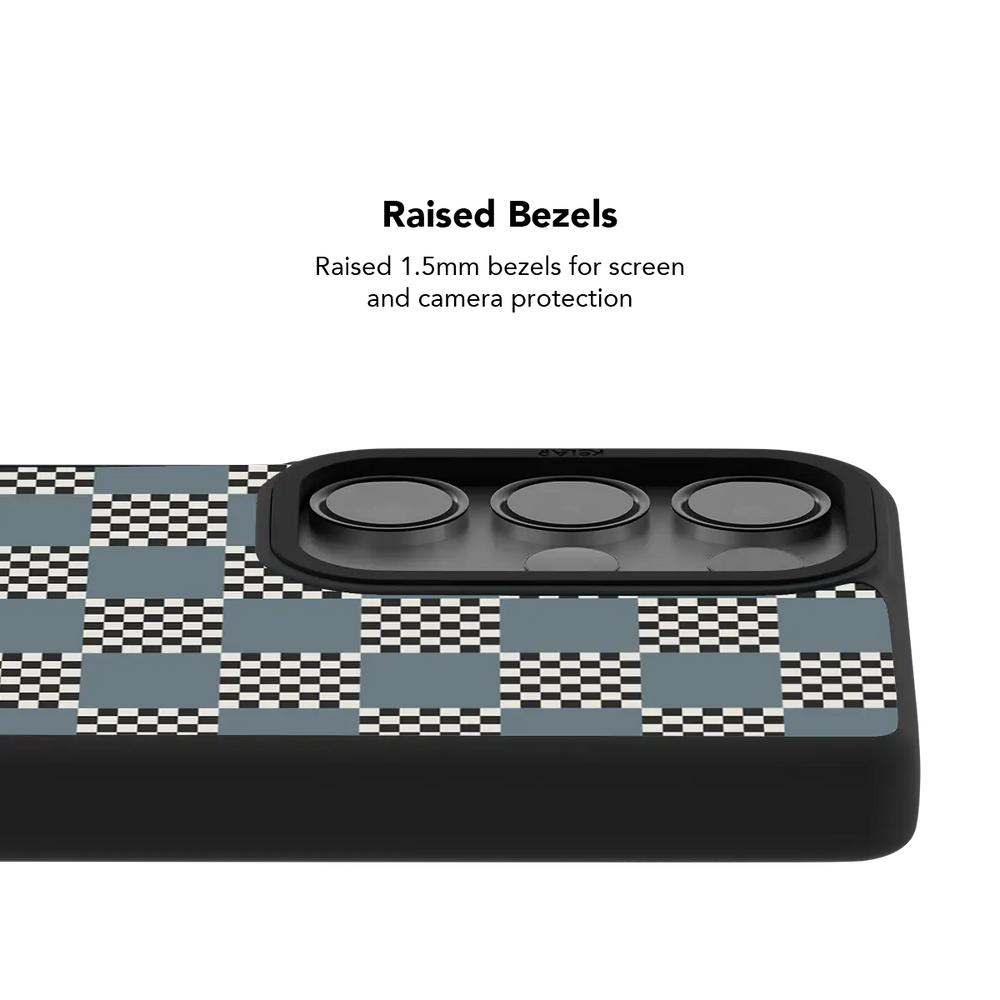Raised bezel on the blue checkerboard Galaxy case lifting the camera lenses clear of a flat surface
